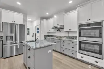 Light filled kitchen. with double oven.