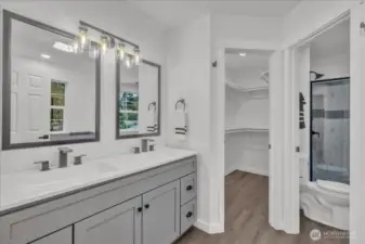 Primary en suite bath with double sinks.