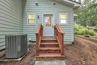 Entry on side of home to laundry/kitchen area.  Heat pump!
