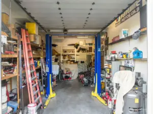 Mechanics Bay with Lift, Garage Wraps around entire lower level