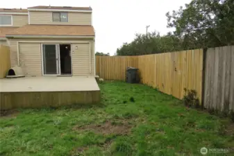 VIEW OF THE FENCED BACK YARD AND DECK!
