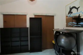 BACK INSIDE THE PRIMARY BEDROOM FROM THE DECK!