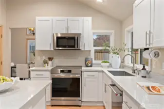 The induction range provides fast, energy-efficient cooking with precise temperature control and easy cleanup.