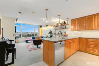 Entry leads into kitchen, living room.