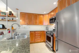 Nice open kitchen space. SS appliances