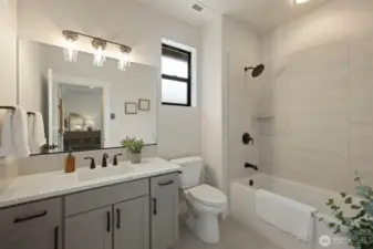 Guest Bathroom - *Former Sinclair floor plan. Garage left. Finishes may vary.