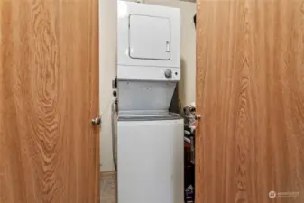 Laundry room with shelving and more storage space. Washer dryer included!