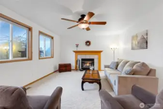 Spacious large family room with a cozy gas fireplace for those cold winter nights. Large windows for plenty of natural light!