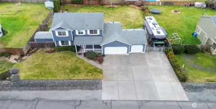 Look at ALL this off street parking you can easily put 3 cars inside and 6 to 8 in the driveway which is great for entertaining! Welcome home to this well kept move-in ready home!