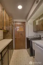 Utility room between kitchen and garage.
