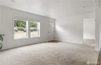 Vaulted throughout, this home offers everything new, plus lots of natural light.  Living, Dining and Kitchen are open for greatroom space