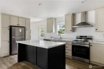 Very nice Kitchen in the center of the Home.  Island allows for stools if you desire