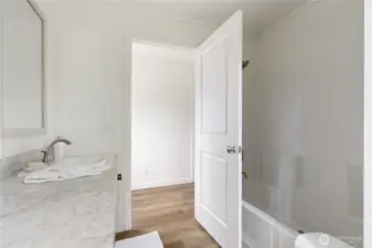Main bath showing shower / tub combination