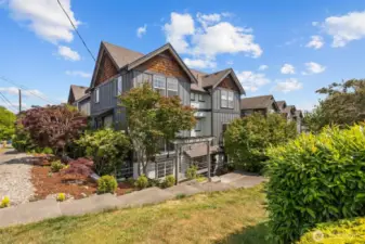 South-facing home is framed with easy maintenance landscaping.