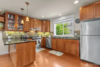 Spacious kitchen has plenty of counter space and storage.