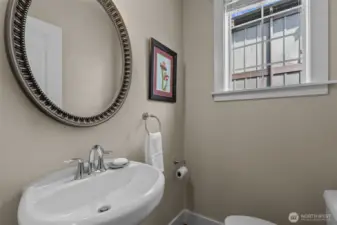 Convenient 1/2 bath next to the kitchen.