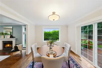 Formal dining room with sliding door to the deck for outdoor enjoyment.