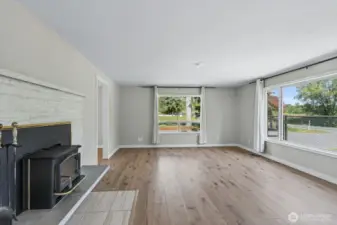 Bright living room w/wood stove insert