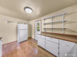 Kitchen has back patio access
