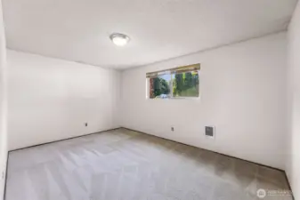Bedroom 1 on front of house with lots of daylight