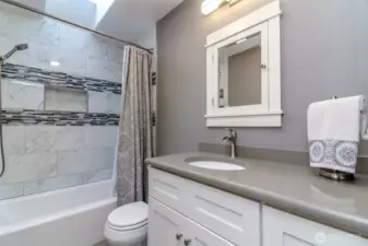 Both Bathrooms updated with stone and tile.