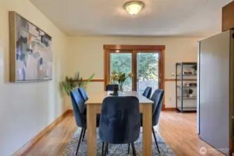 Spacious dining Room, perfect for family meals or entertaining guests, this room offers plenty of natural light and a seamless flow into the living areas.