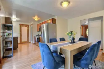 A spacious, flowing layout that seamlessly connects cooking and dining, perfect for family gatherings and hosting friends.