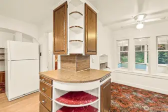 Love the character of this vintage kitchen.  Space to the right is the breakfast nook.