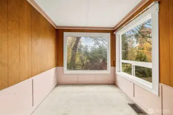 Bedroom 3 featuring large windows.