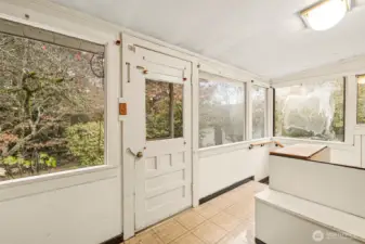 Access to side yard and a great place to have a mudd room.  Stairs go down to laundry and additional storage.