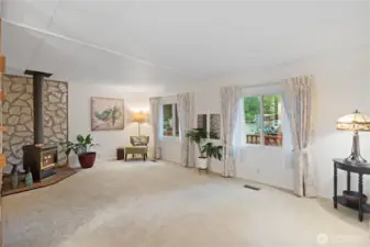 Nice open living room with plenty of windows for natural light