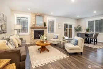 Open space great room with ample natural lighting.