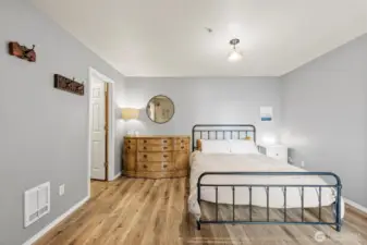 Spacious primary bedroom and walk in closet.