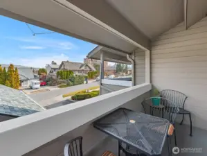 Covered deck with beautiful city and mountain views