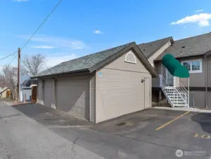 One uncovered parking space in addition to two car garage