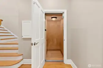 The glorious elevator - this goes to all four floors. Accommodating for guest, groceries, aging in place, etc. This feature makes this home approachable for all! Living floor powder room is to the left in this photo. Stairs lead to the top level.