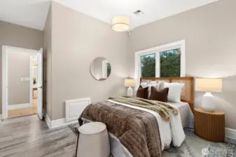 Also on this level is another bedroom or flex space. This room could be the perfect nursery or exercise room. It has a door to the primary bath too!