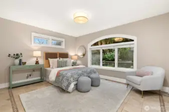 The second bedroom here is large enough for a king-sized bed and has it's own attached full bath!