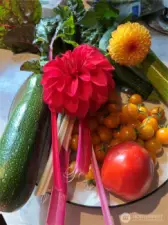 A sampling of the many flowers and vegetables grown in these gardens