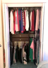 Bedroom has second added custom closet  to easily acomodate  his and hers.