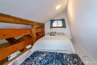 a good size loft with room for a queen bed and makes for a great bonus sleeping area.