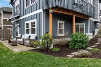 The back yard features a nice patio and plenty of lawn plus planting areas. This backyard is fully fenced. The patio can be accessed from the Rec Room.