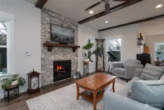 Another view of the great room with natural gas fireplace.