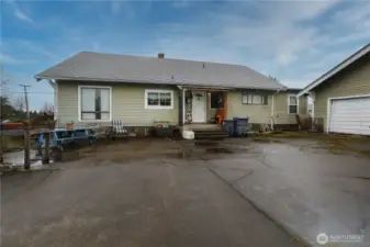 Side patio and additional off-street parking.