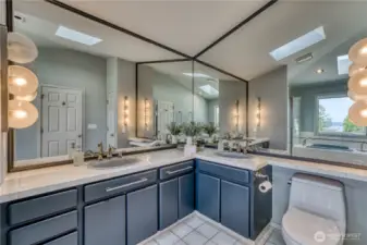 Primary bathroom with a view and lots of storage room.  Tough to beat that.