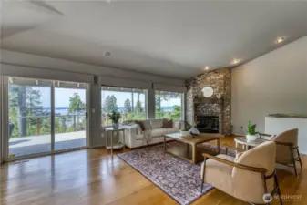 This great room is the heart of the home.  Open to kitchen, dining area and large deck, it provides perfect flow for living or entertaining.