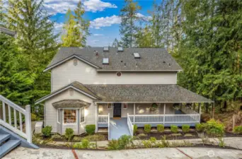This home is tucked below street level for the ultimate private retreat.