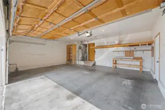 3 Car garage wired for generator with additional RV parking.