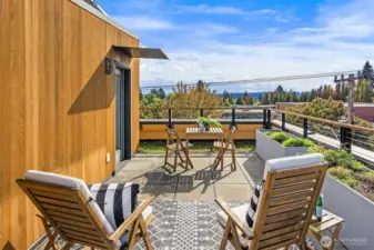 Corner unit, private rooftop deck. Extra privacy and light!