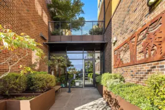 Entrance to the building.  This is secure and keeps your packages safe and allows you or your guests to also be safe.  you will probably enteer via the secure garage but this is how your friends and family will come. You can meet them in the lobby or buzz them in.